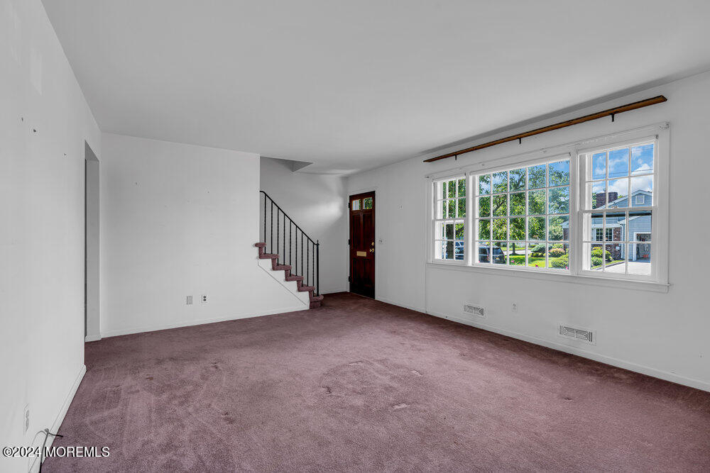 4 Cherry Place Manasquan, NJ 08736 - Photo 15 of 46 an empty room with windows