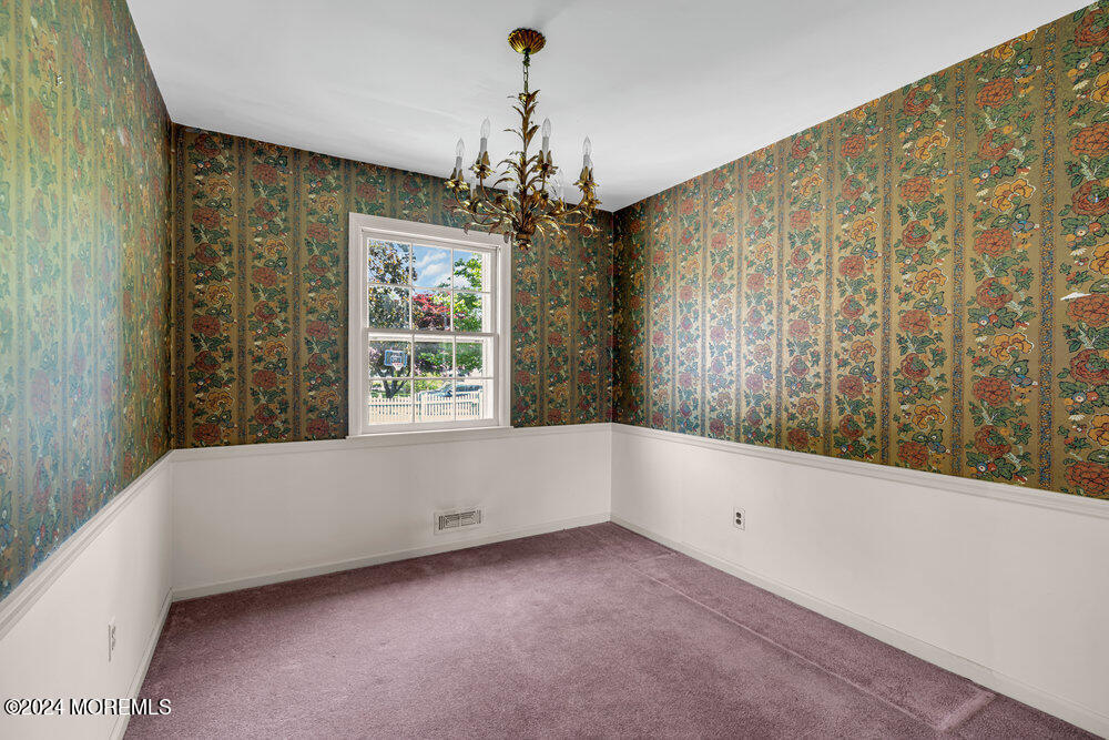 4 Cherry Place Manasquan, NJ 08736 - Photo 22 of 46 a view of an empty room with a window