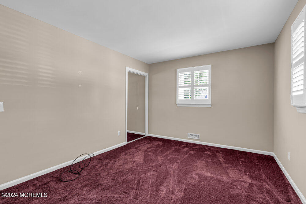 4 Cherry Place Manasquan, NJ 08736 - Photo 28 of 46 an empty room with windows