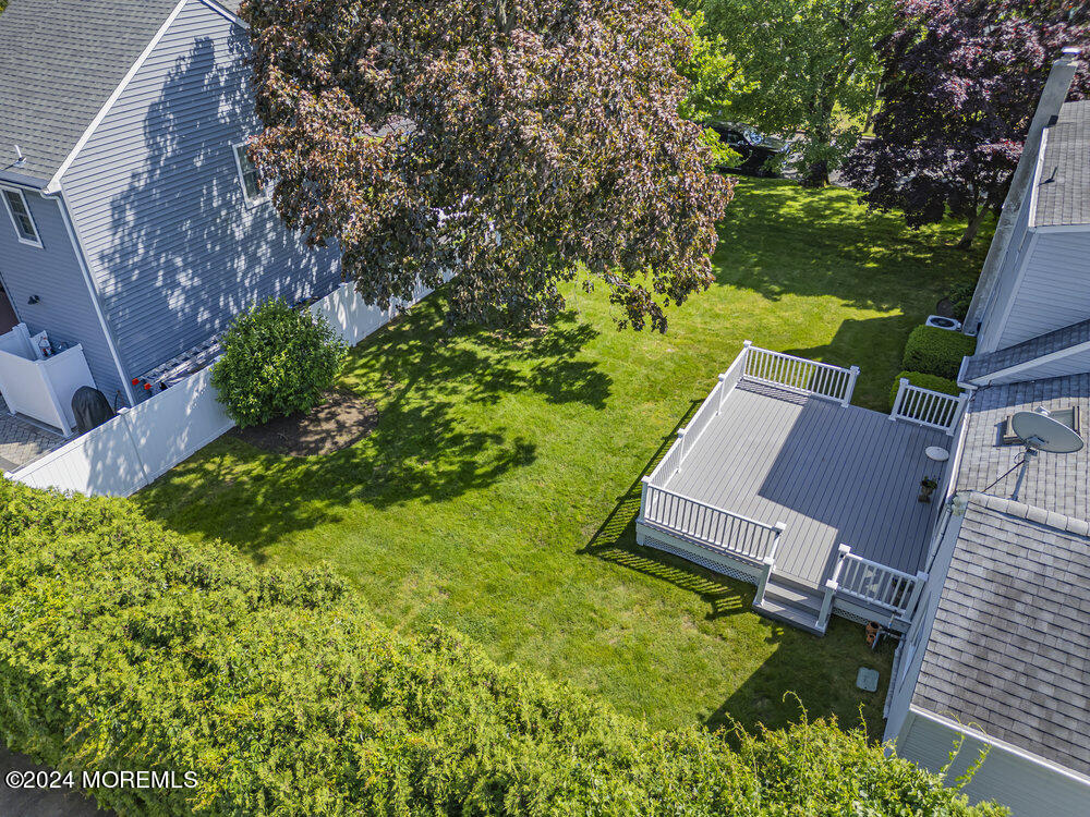 4 Cherry Place Manasquan, NJ 08736 - Photo 43 of 46 front view of a house with a yard