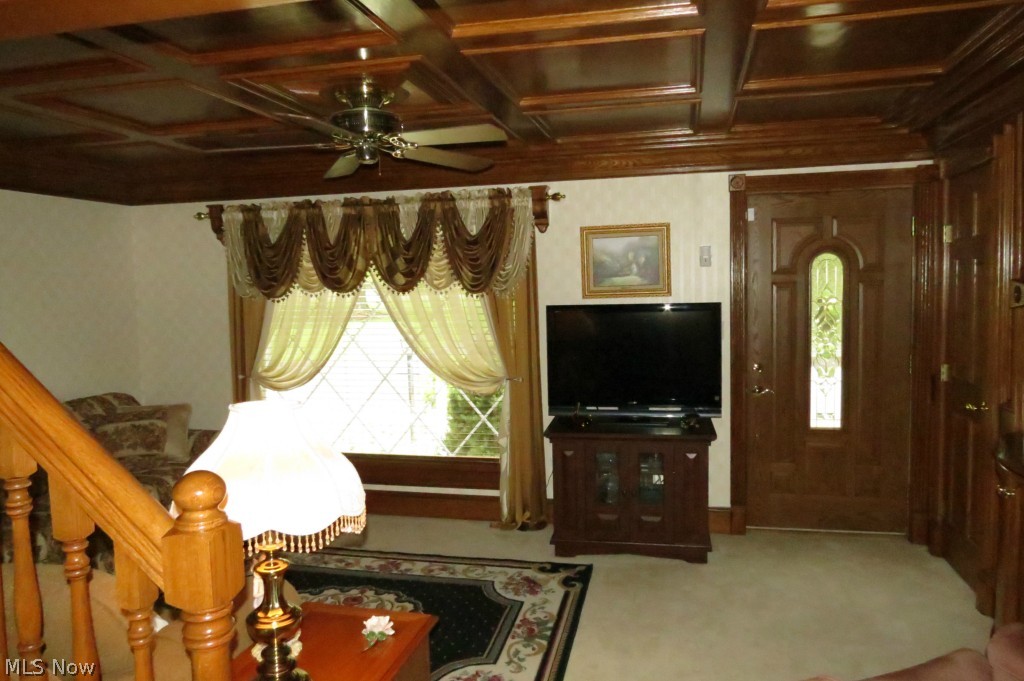 10561 Diagonal Road Mantua, OH 44255 - Photo 5 of 21 Living room right when you walk into the home with beautiful wood ceilings, a must see!