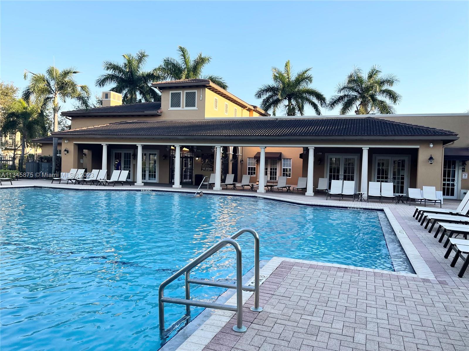 Cobblestone Pembroke Pines, FL 33027 - Photo 16 of 17 a front view of a house with porch