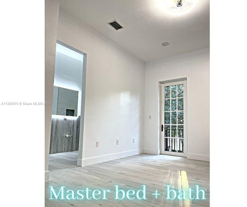 Cobblestone Pembroke Pines, FL 33027 - Photo 6 of 17 a view of an empty room with a window