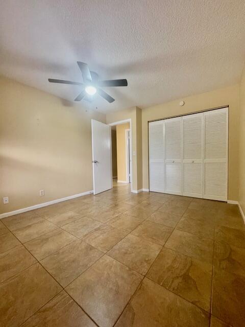 5939 Forest Hill Boulevard, Unit 205 West Palm Beach, FL 33415 - Photo 11 of 19 a view of an empty room