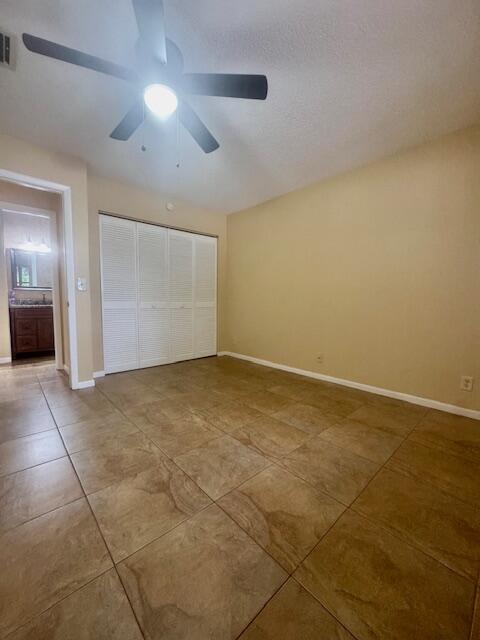 5939 Forest Hill Boulevard, Unit 205 West Palm Beach, FL 33415 - Photo 12 of 19 a view of an empty room