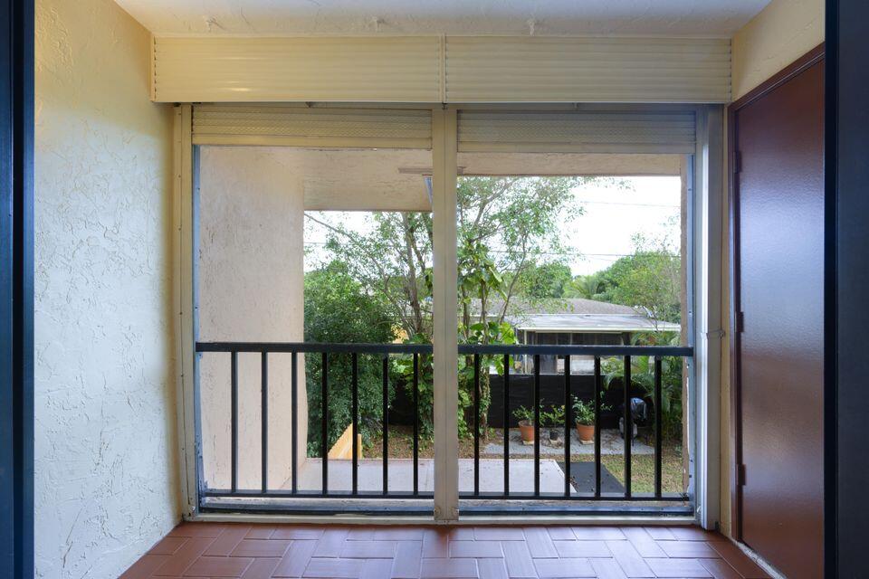 5939 Forest Hill Boulevard, Unit 205 West Palm Beach, FL 33415 - Photo 15 of 19 a view of a balcony