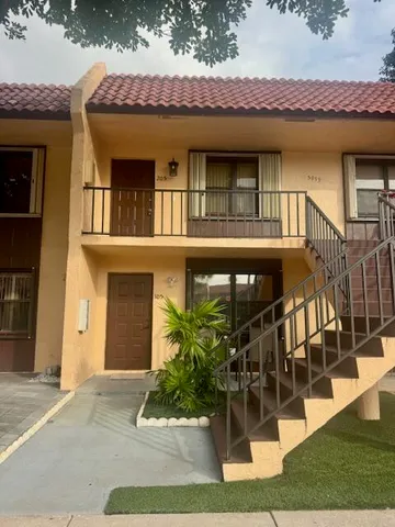 a view of house with outdoor space