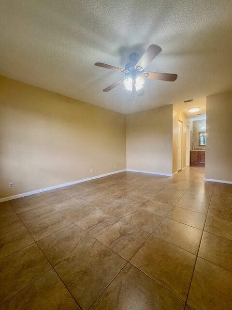 5939 Forest Hill Boulevard, Unit 205 West Palm Beach, FL 33415 - Photo 7 of 19 a view of an empty room