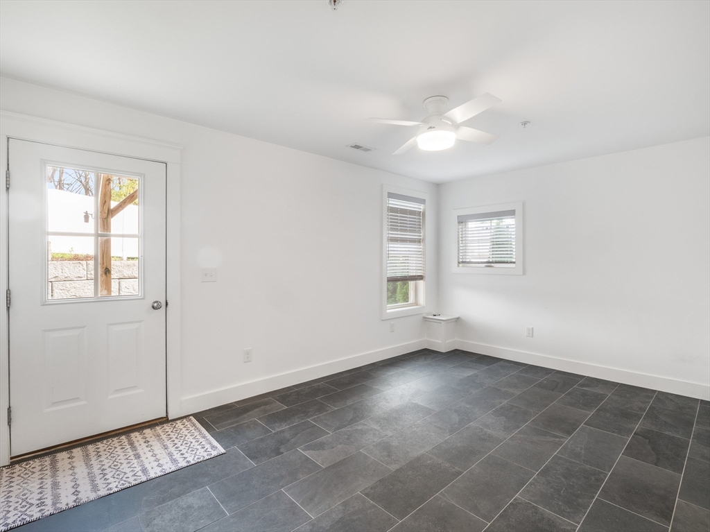 12 Hines, Unit 12 Newburyport, MA 01950 - Photo 7 of 32 a view of an empty room with a window
