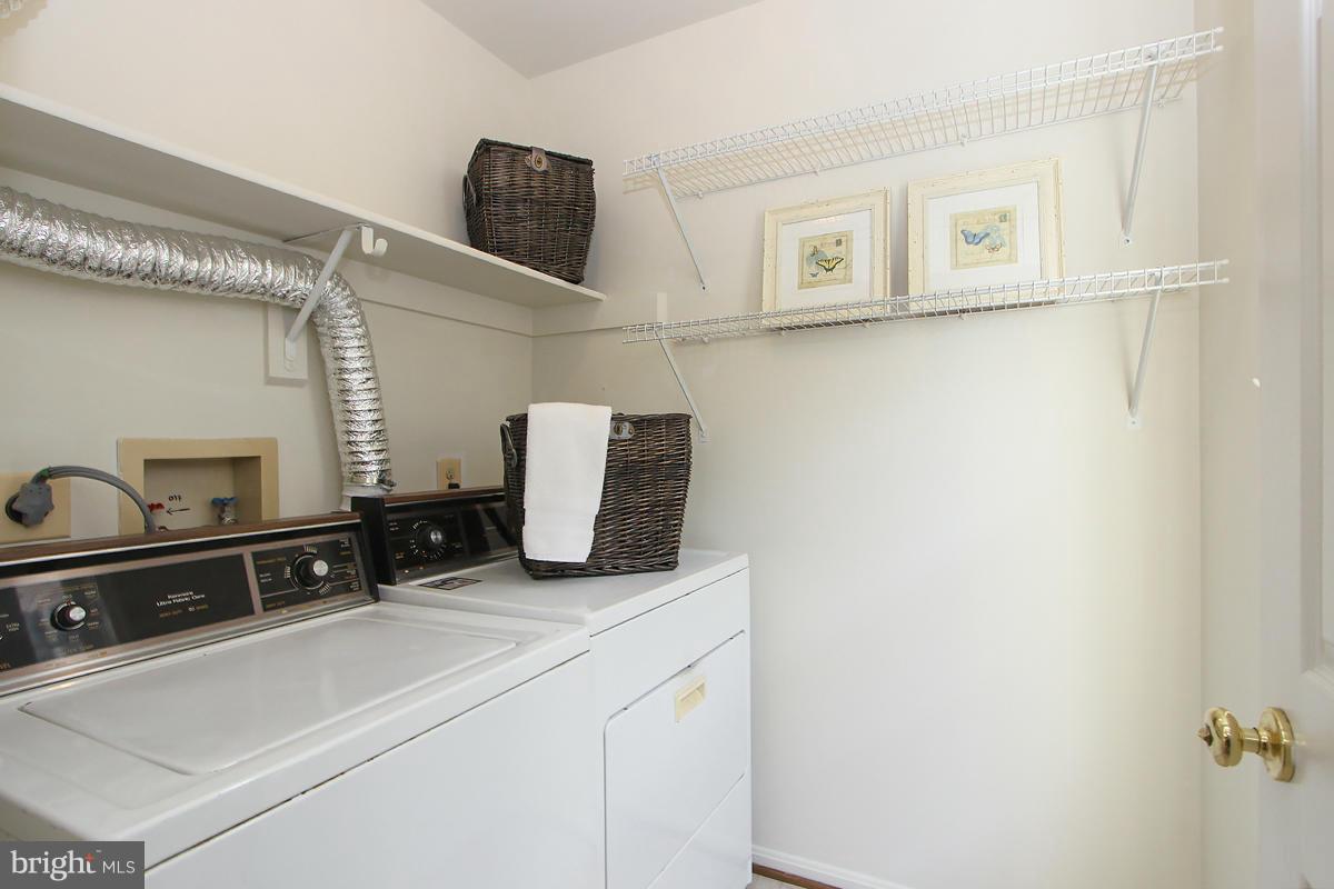 204 Ridgepoint Place Gaithersburg, MD 20878 - Photo 19 of 30 LAUNDRY ROOM NEXT TO KITCHEN