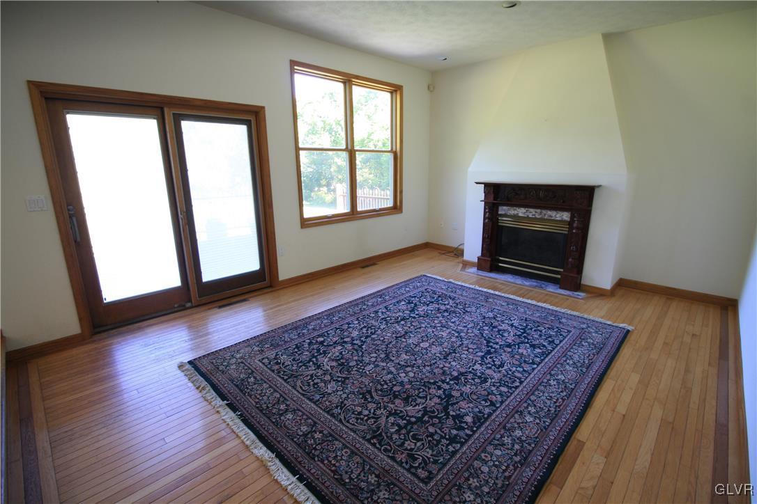 41 Bunny Trail Road Bangor, PA 18013 - Photo 8 of 14 Family room with hardwood floors and gas fireplace