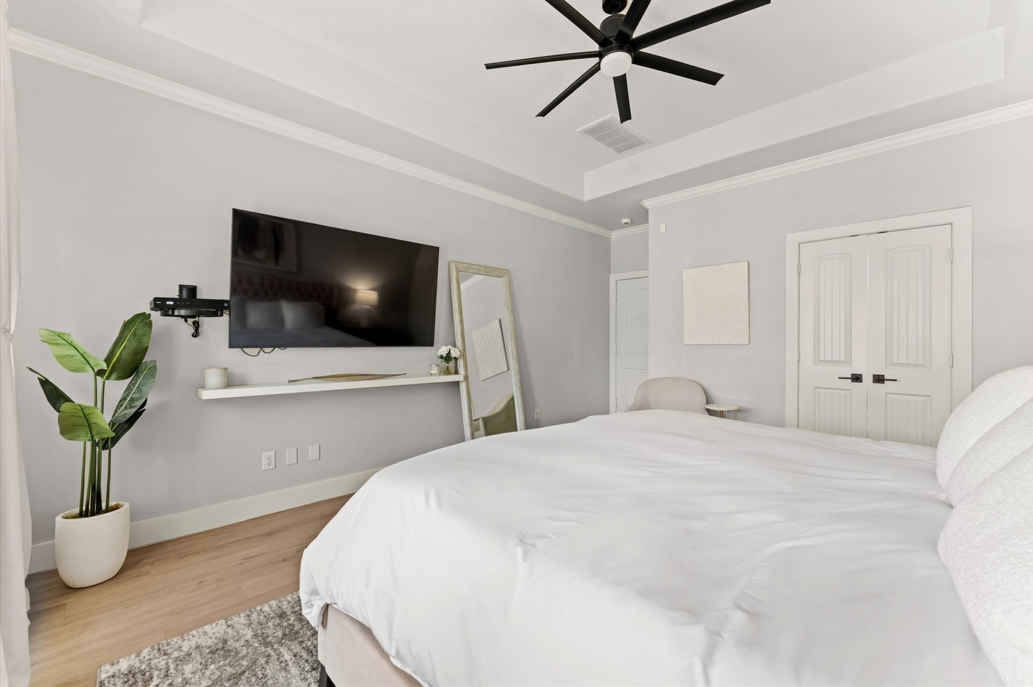 14016 Savannah Landing Lane Rosharon, TX 77583 - Photo 22 of 49 a bedroom with a bed and a flat screen tv