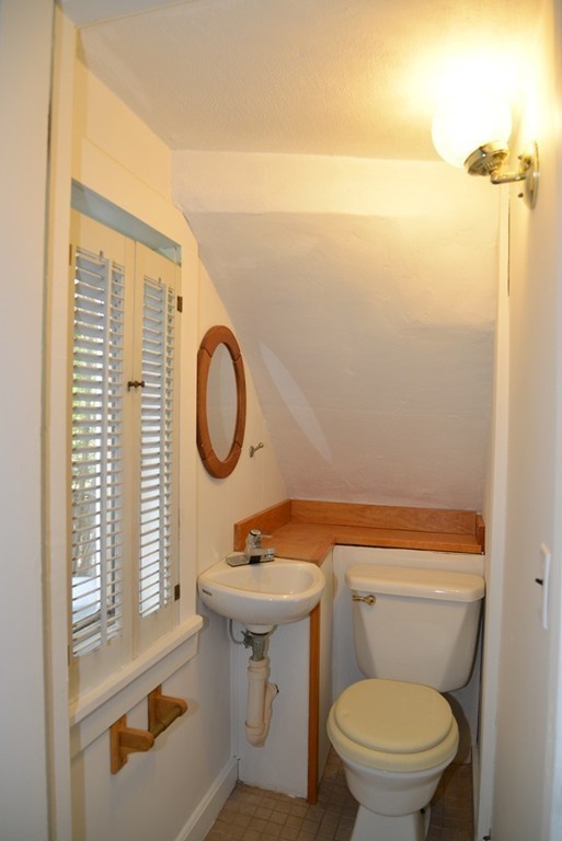 785 Bulgarmarsh Road Tiverton, RI 02878 - Photo 14 of 28 a bathroom with a sink toilet and a mirror