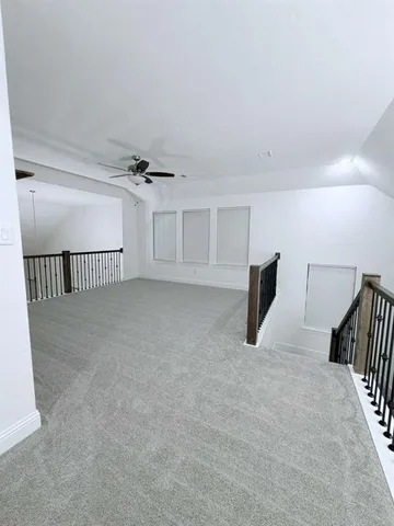 a view of a livingroom with a staircase