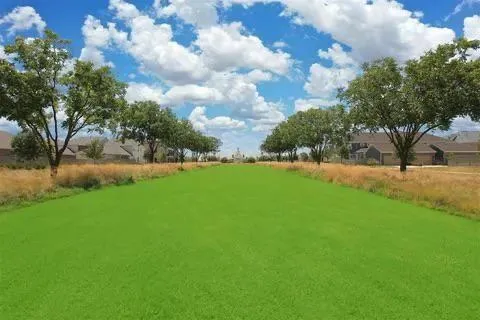 a view of a swimming pool and outdoor space