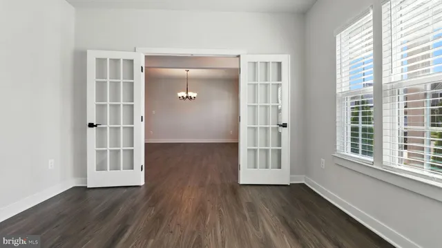 a view of a kitchen with a sink and a fireplace