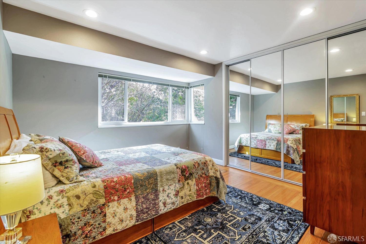 3 Harran Circle Orinda, CA 94563 - Photo 15 of 34 a bedroom with a bed and wooden floor