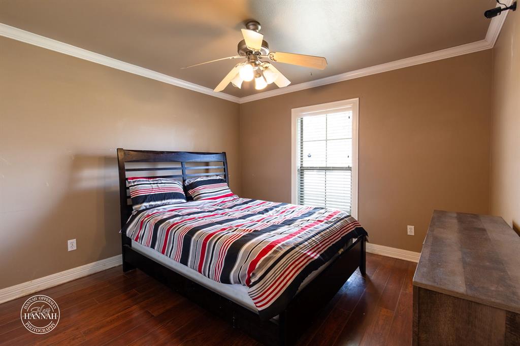 6531 North Liberty Way Keithville, LA 71047 - Photo 18 of 28 a bedroom with a bed and window