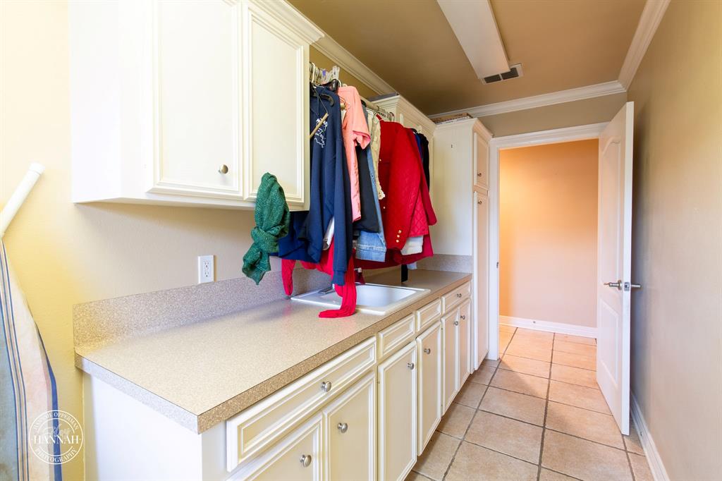 6531 North Liberty Way Keithville, LA 71047 - Photo 22 of 28 a kitchen with a sink and a refrigerator