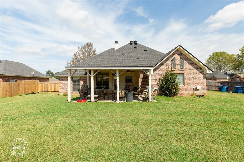6531 North Liberty Way Keithville, LA 71047 - Photo 25 of 28 a front view of a house with a yard and porch