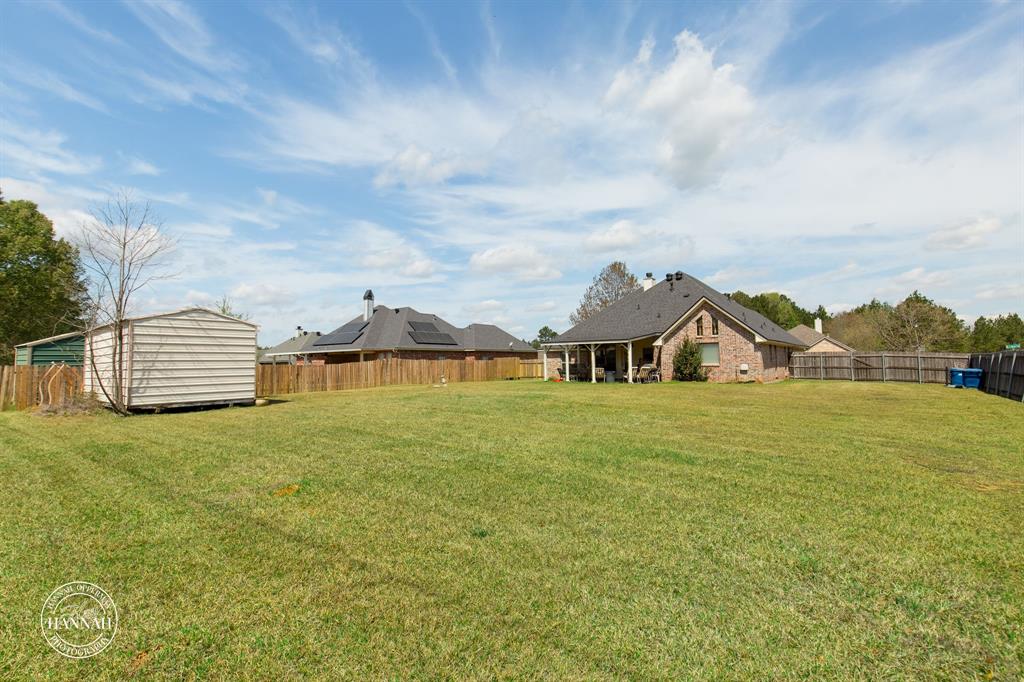 6531 North Liberty Way Keithville, LA 71047 - Photo 28 of 28 a front view of a house with a yard and lake view