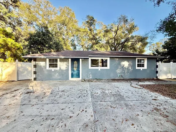 front view of a house with a dry yard
