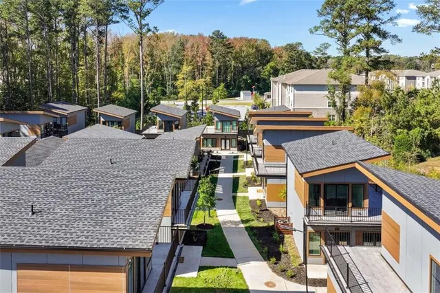 a view of buildings with a street