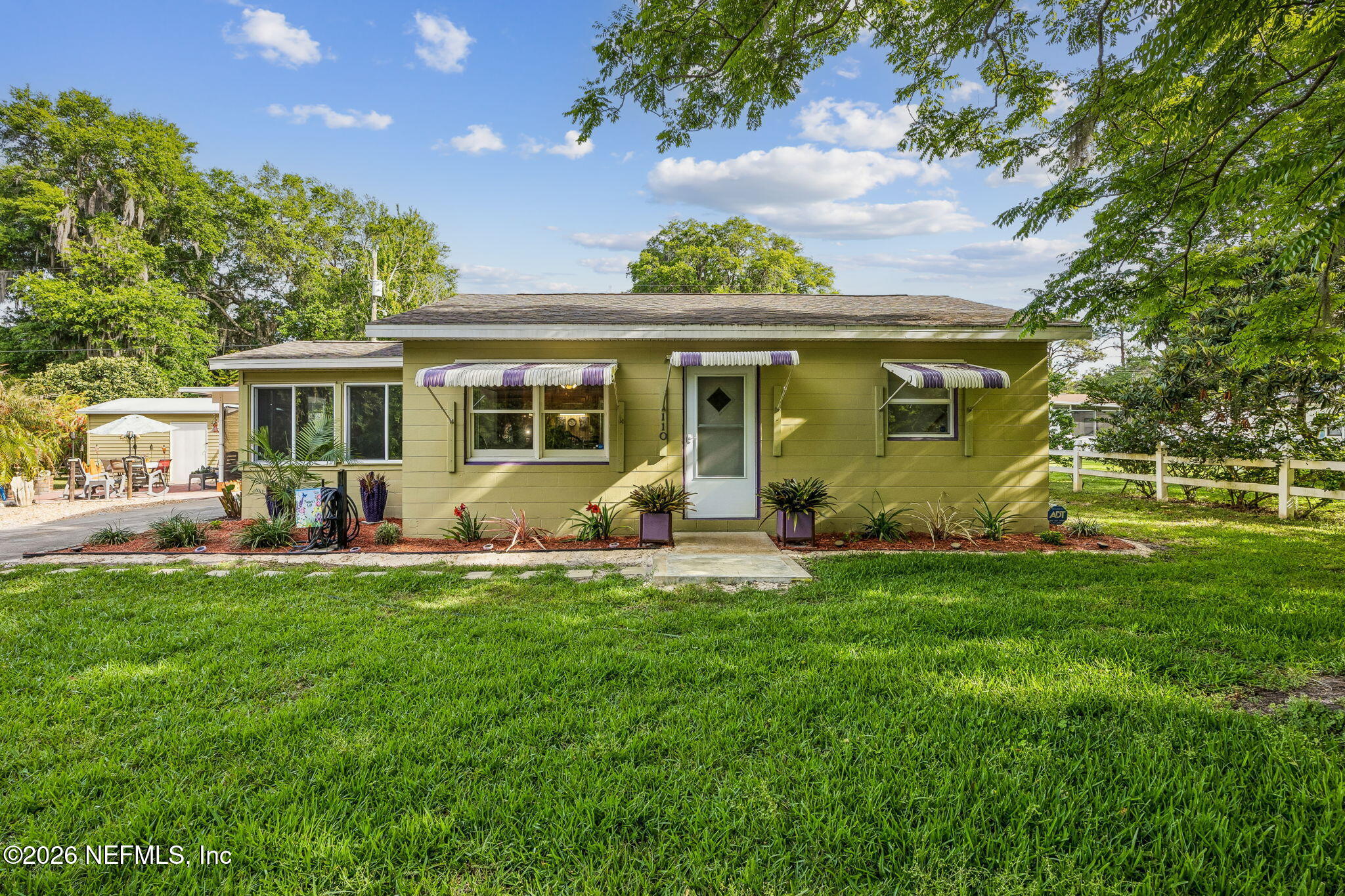 110 Shaffer Avenue Crescent City, FL 32112 - Photo 1 of 44 a view of a house with a backyard porch and sitting area