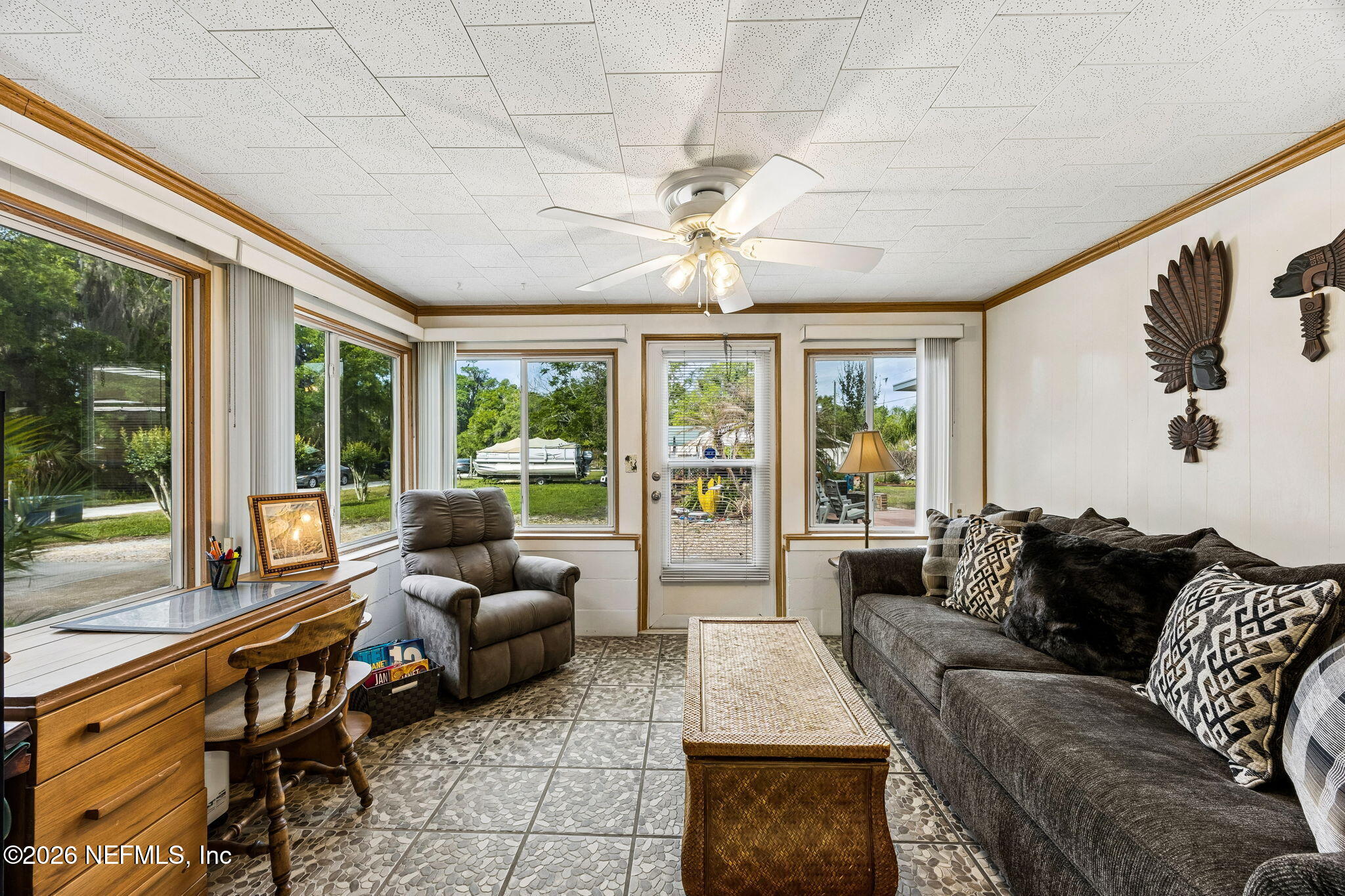 110 Shaffer Avenue Crescent City, FL 32112 - Photo 10 of 44 a living room with furniture and a large window