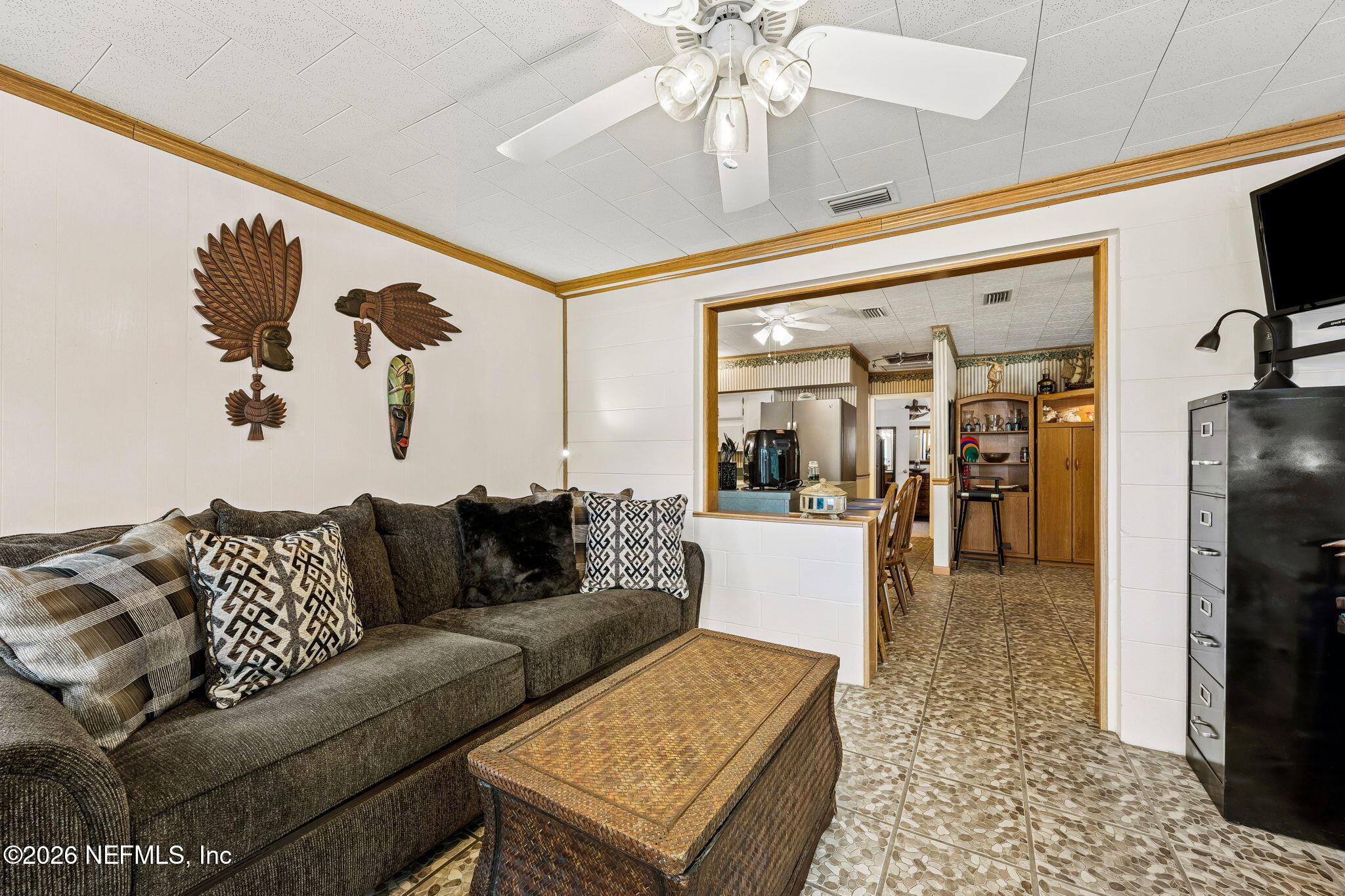 110 Shaffer Avenue Crescent City, FL 32112 - Photo 11 of 44 a living room with furniture and a rug