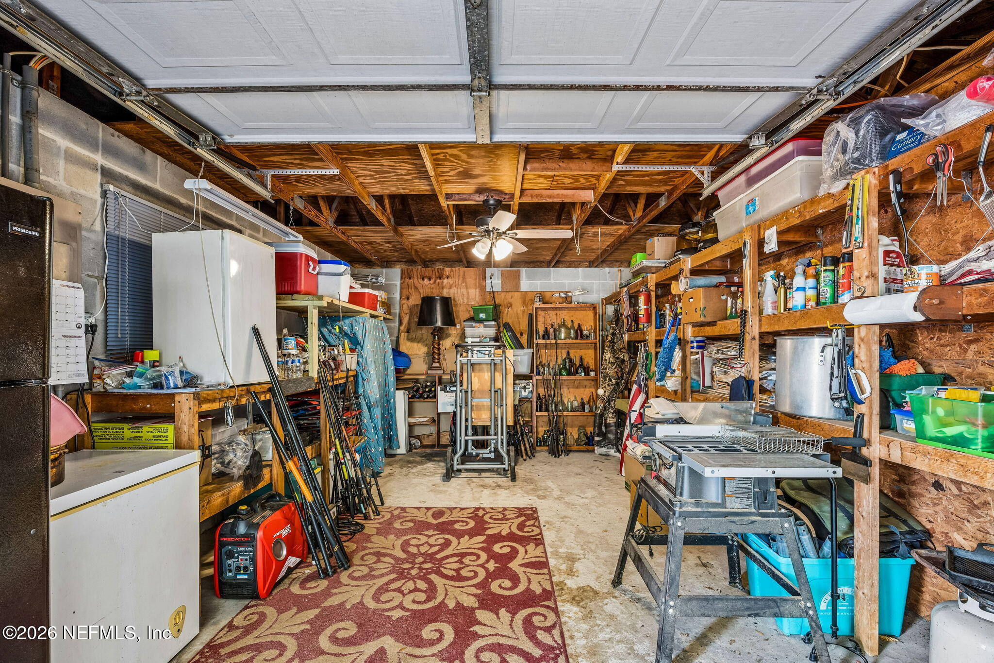 110 Shaffer Avenue Crescent City, FL 32112 - Photo 22 of 44 a view of a storage room with furniture