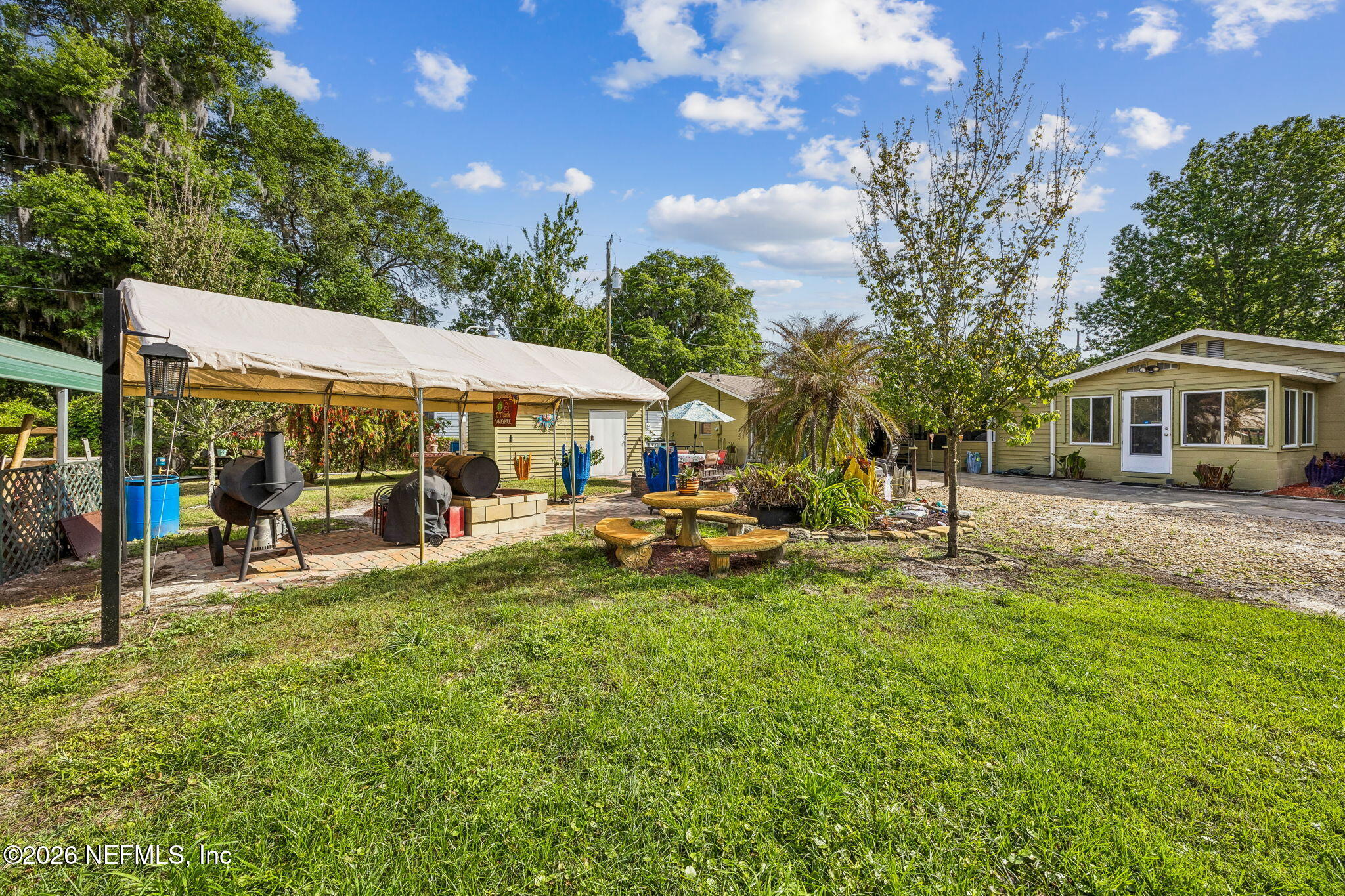 110 Shaffer Avenue Crescent City, FL 32112 - Photo 25 of 44 a view of a house with swimming pool and sitting area