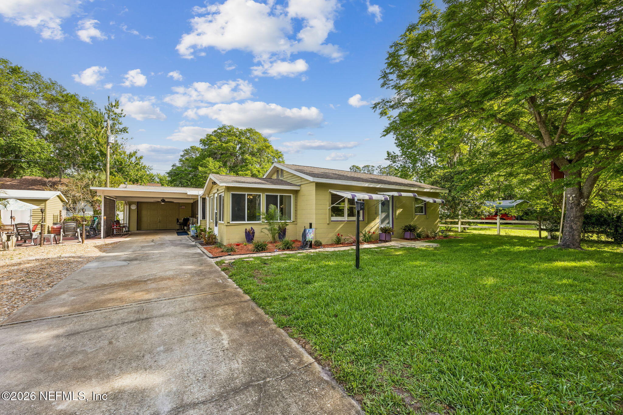 110 Shaffer Avenue Crescent City, FL 32112 - Photo 30 of 44 a front view of house with a garden