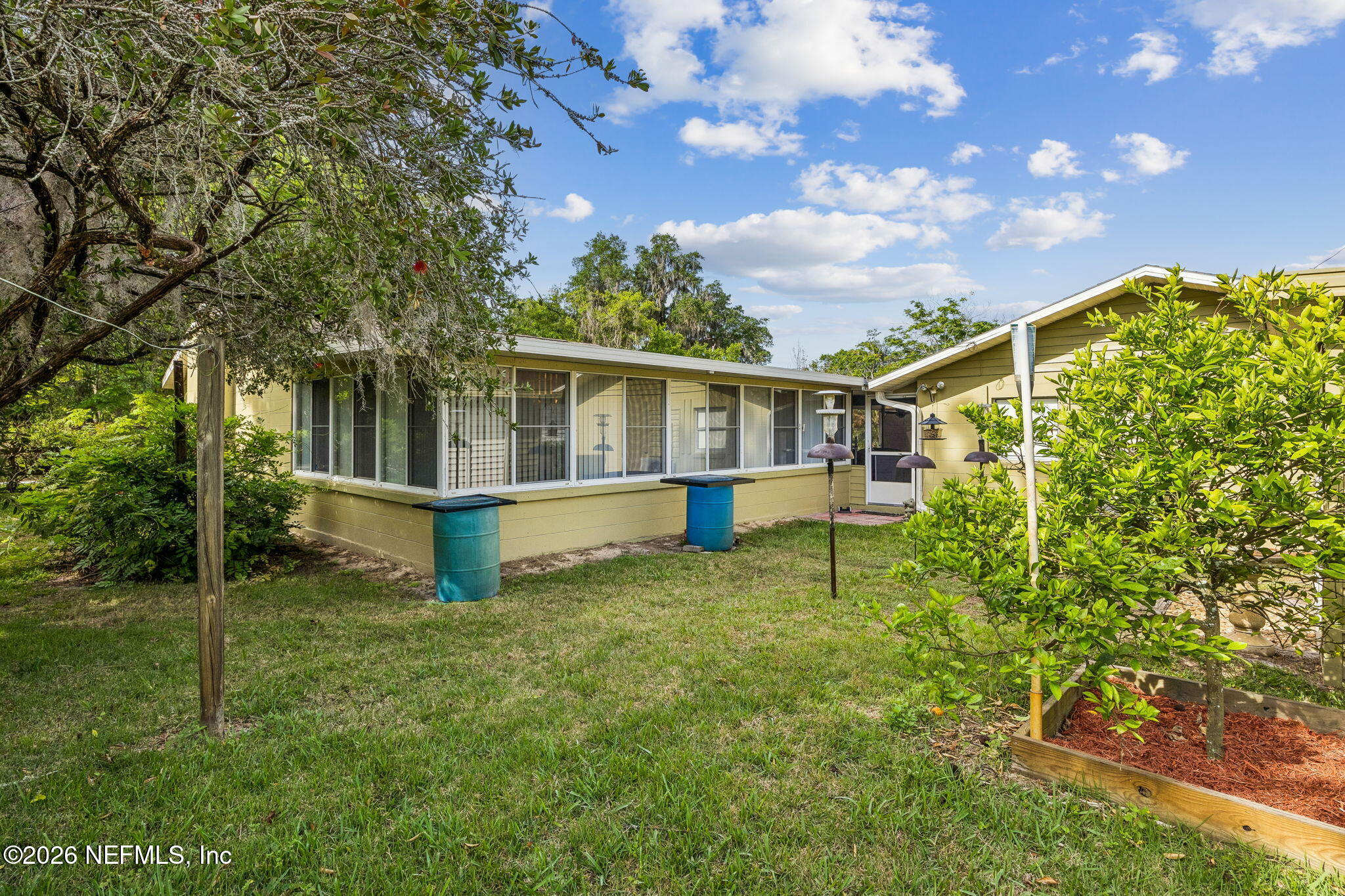 110 Shaffer Avenue Crescent City, FL 32112 - Photo 31 of 44 a house with trees in the background