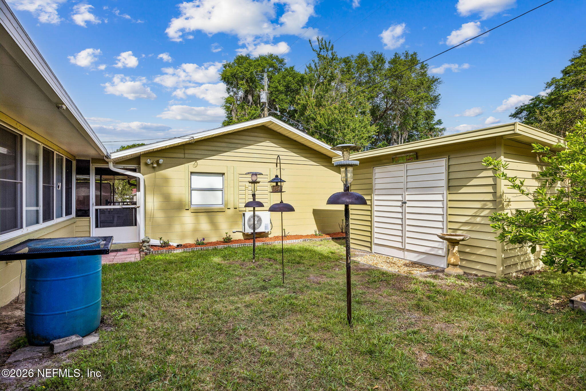 110 Shaffer Avenue Crescent City, FL 32112 - Photo 32 of 44 a front view of a house with a yard