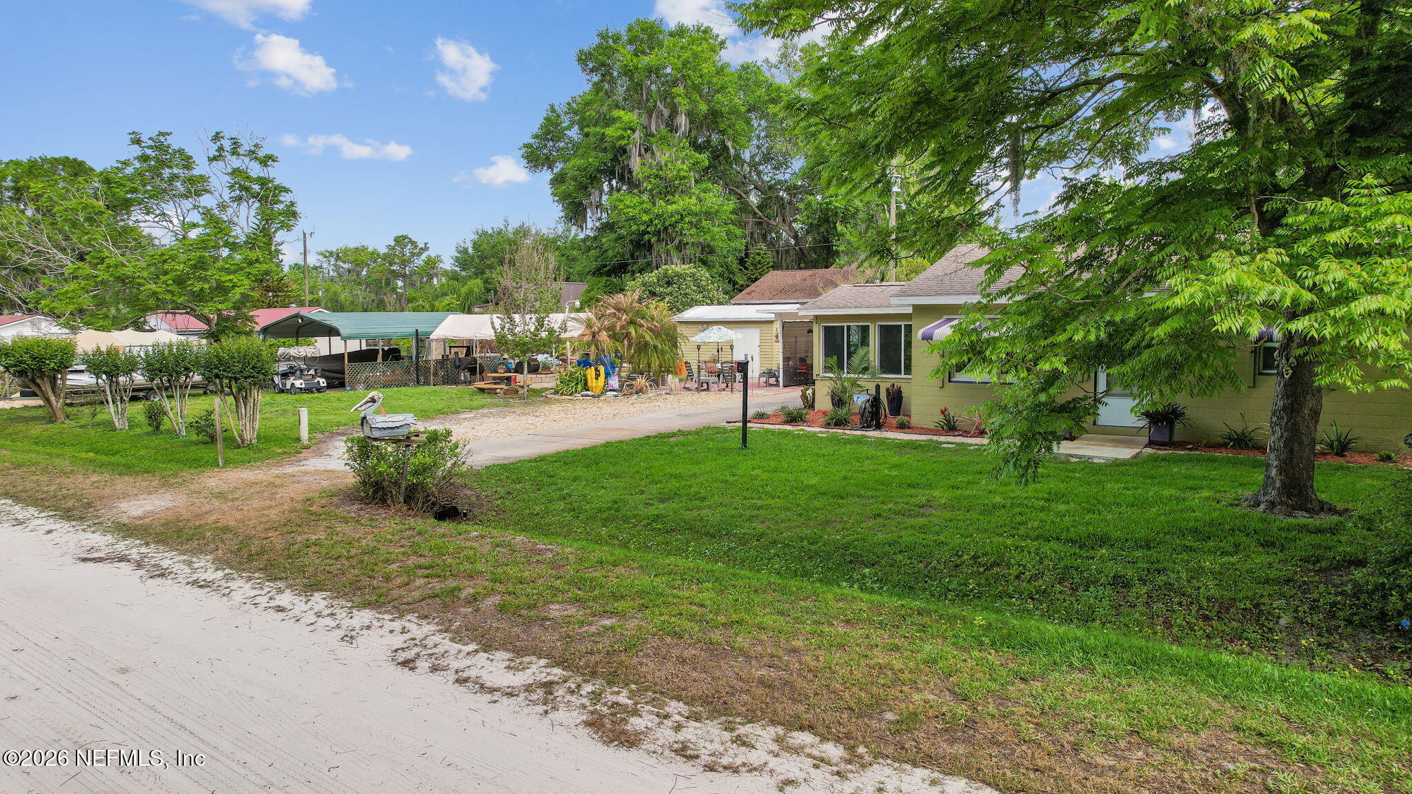 110 Shaffer Avenue Crescent City, FL 32112 - Photo 34 of 44 a view of a house with a yard porch and sitting area