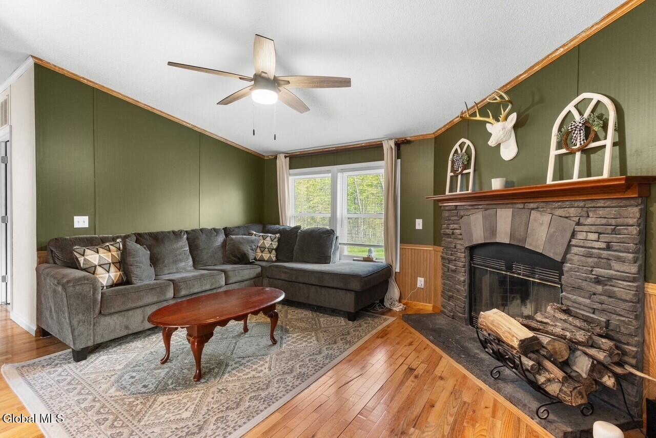 107 Fording Road Esperance, NY 12066 - Photo 15 of 42 AI staging family room green
