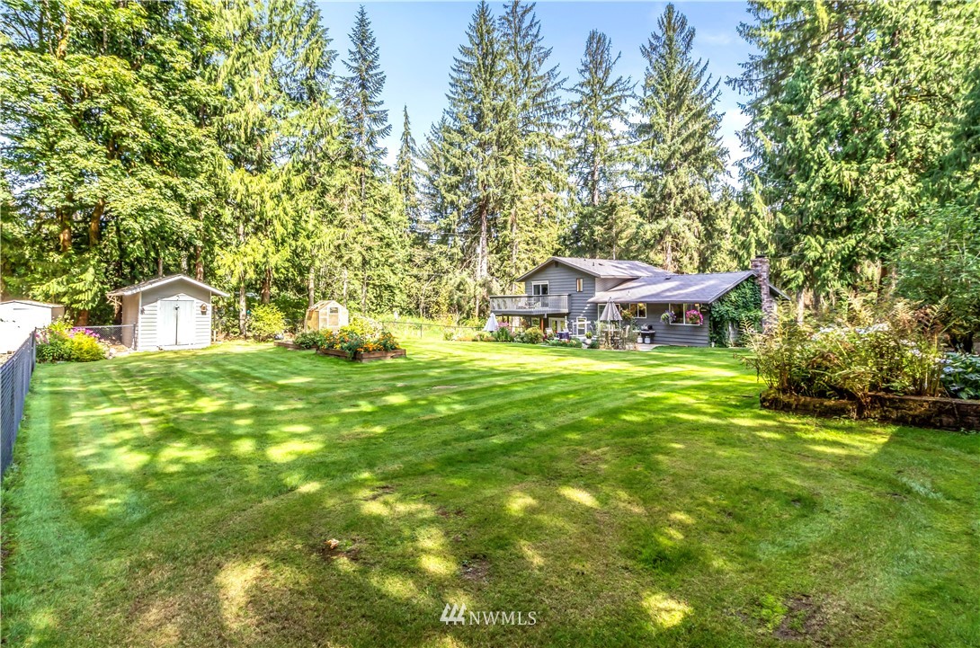 6218 Robe Menzel Road Granite Falls, WA 98252 - Photo 12 of 37 a house with swimming pool in front of it