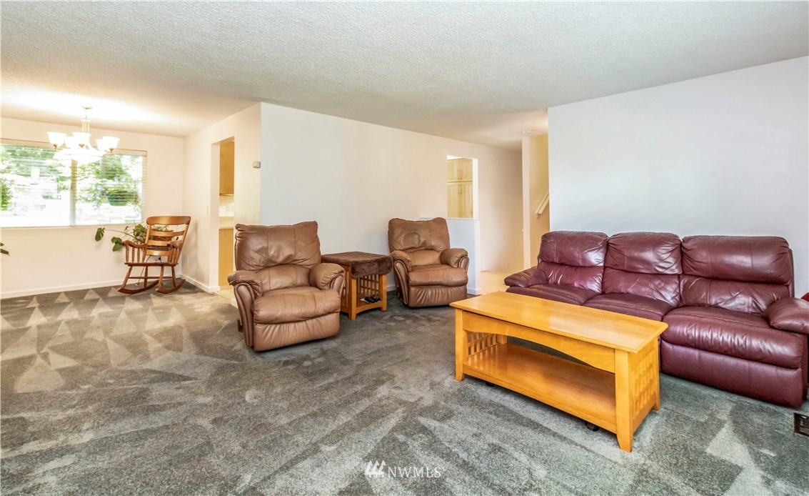 6218 Robe Menzel Road Granite Falls, WA 98252 - Photo 21 of 37 a living room with furniture and a large window