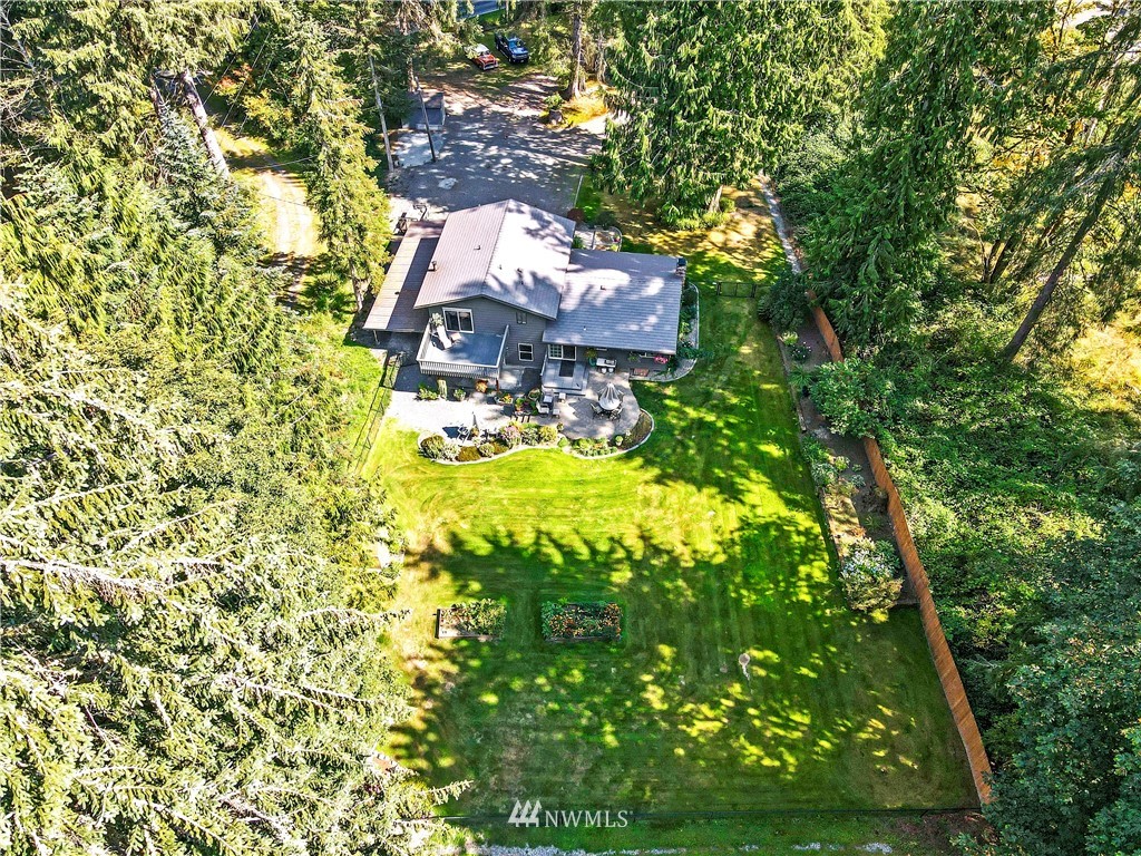 6218 Robe Menzel Road Granite Falls, WA 98252 - Photo 6 of 37 a backyard of a house with lots of green space