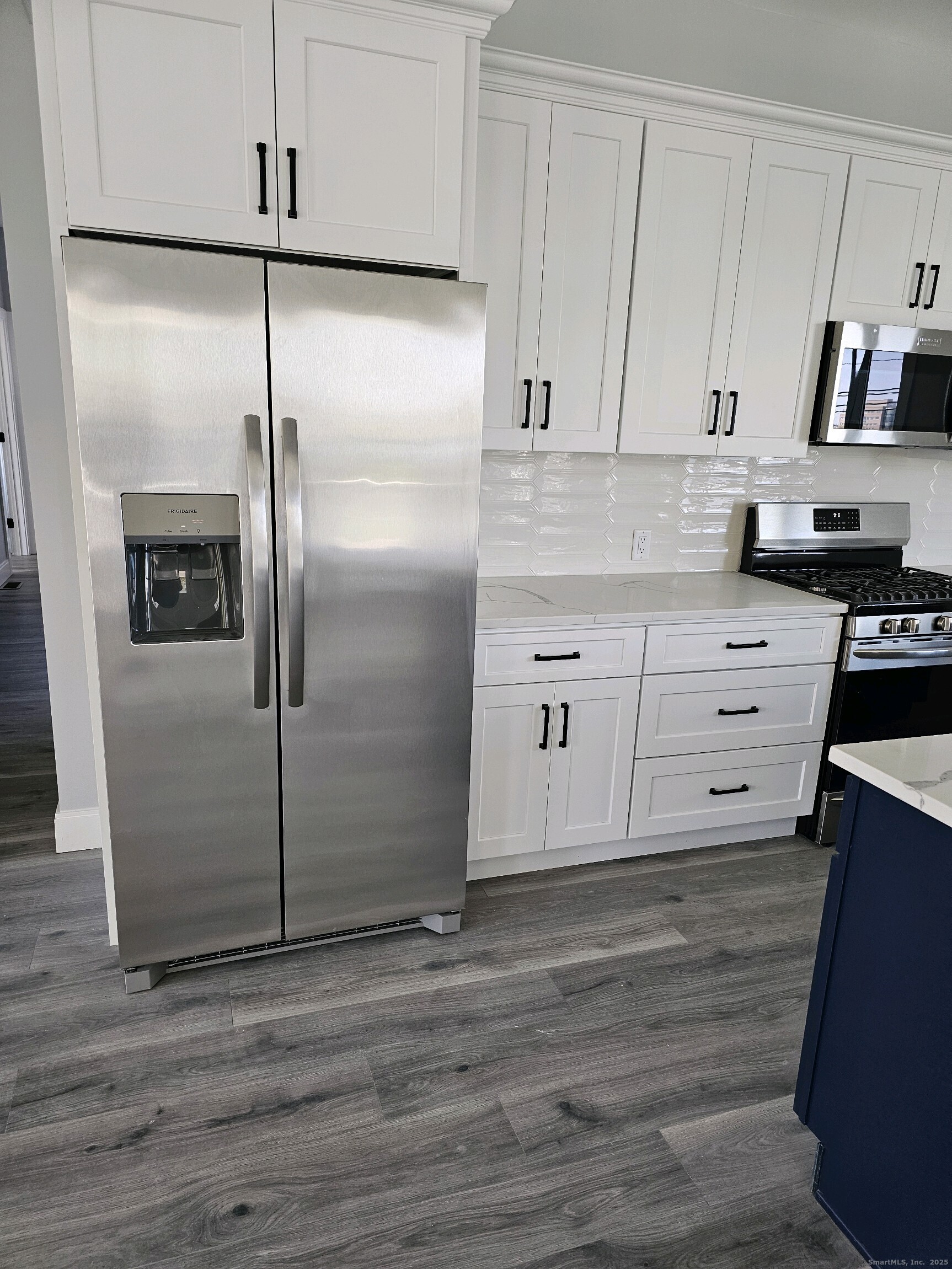281 Pequot Avenue, Unit 2 New London, CT 06320 - Photo 16 of 21 a kitchen with stainless steel appliances a refrigerator and a stove