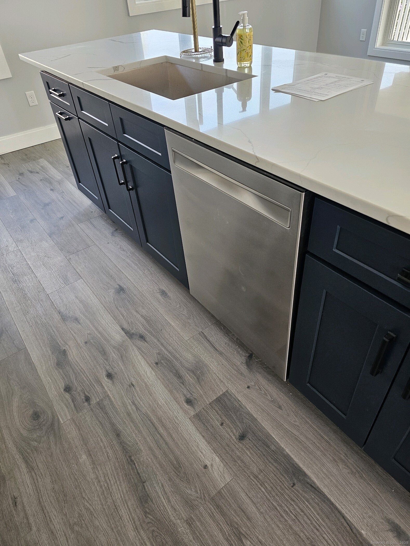 281 Pequot Avenue, Unit 2 New London, CT 06320 - Photo 18 of 21 a utility room with wooden floor