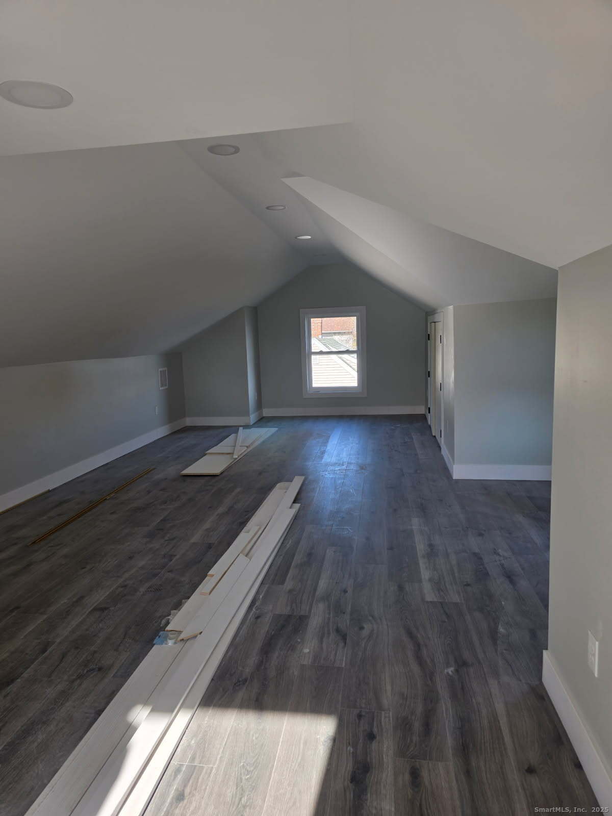 281 Pequot Avenue, Unit 2 New London, CT 06320 - Photo 21 of 21 a view of empty room with wooden floor and fan