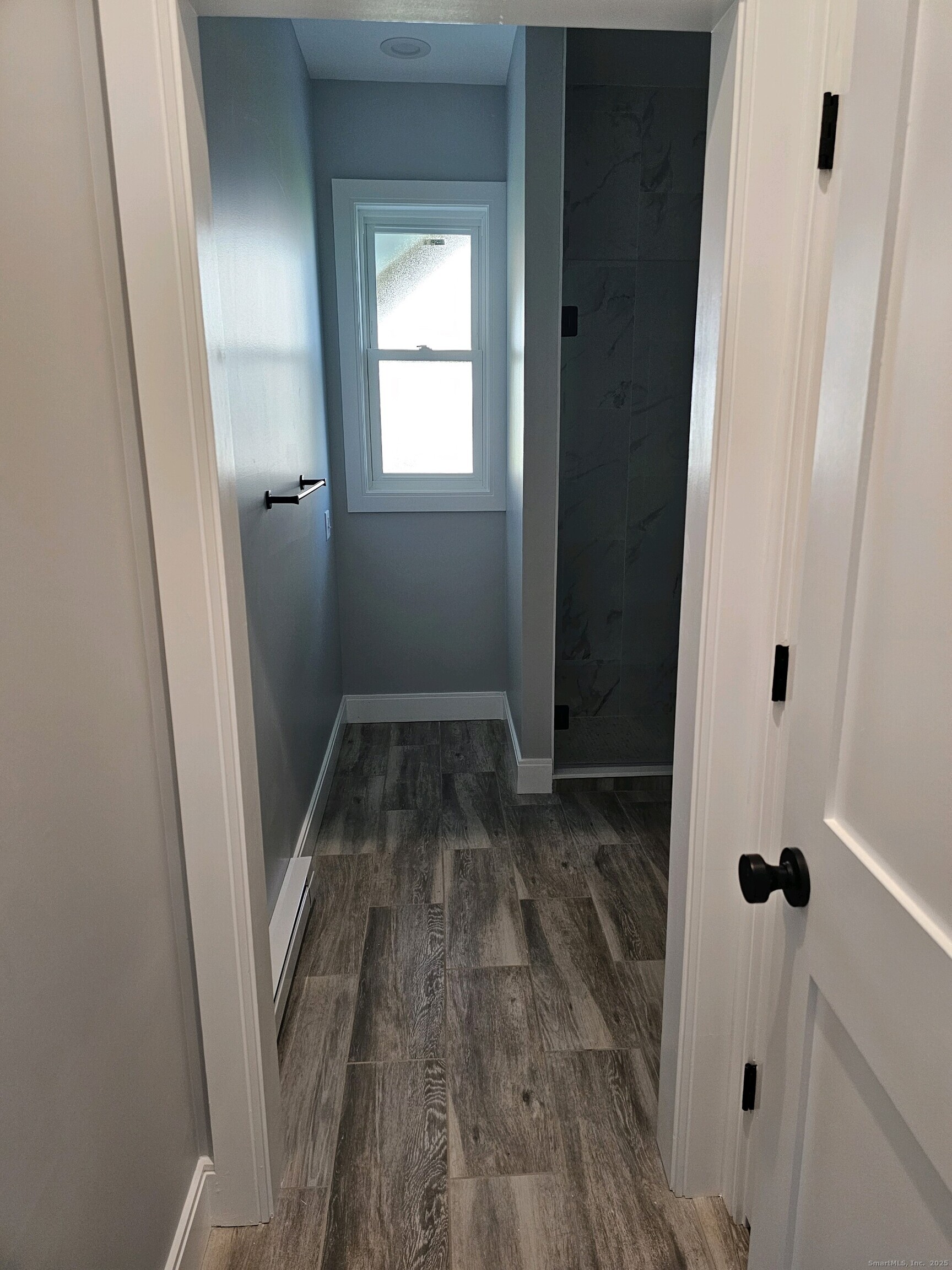 281 Pequot Avenue, Unit 2 New London, CT 06320 - Photo 8 of 21 a view of front door with wooden floor