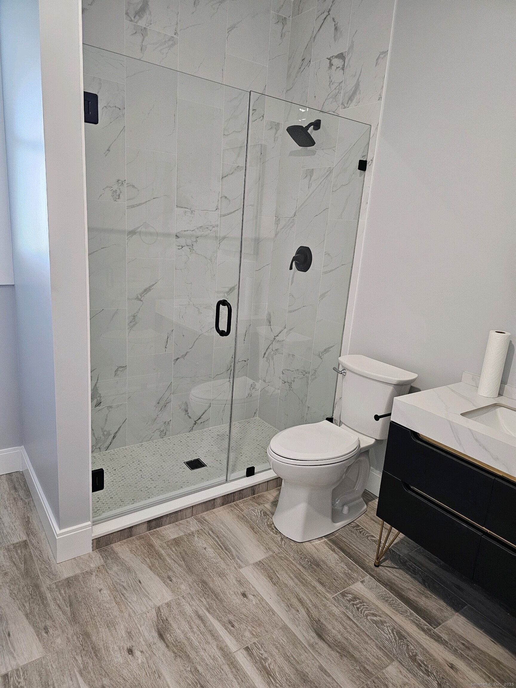 281 Pequot Avenue, Unit 2 New London, CT 06320 - Photo 9 of 21 a bathroom with a toilet a sink and a shower