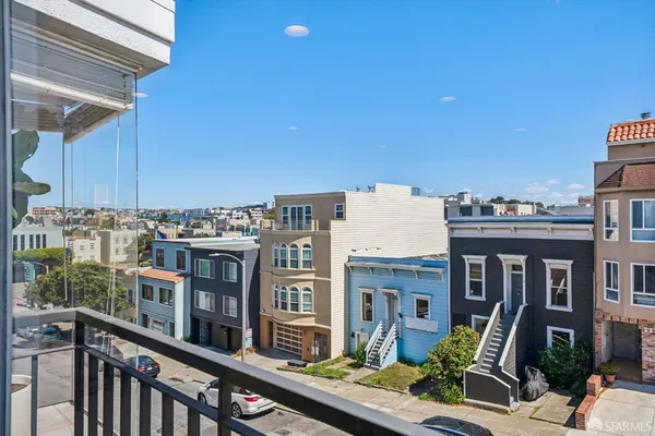 a view of a building from a balcony