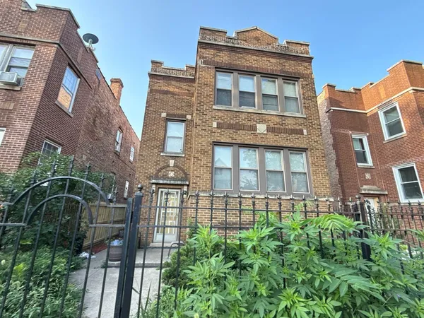a front view of a multi story residential apartment building