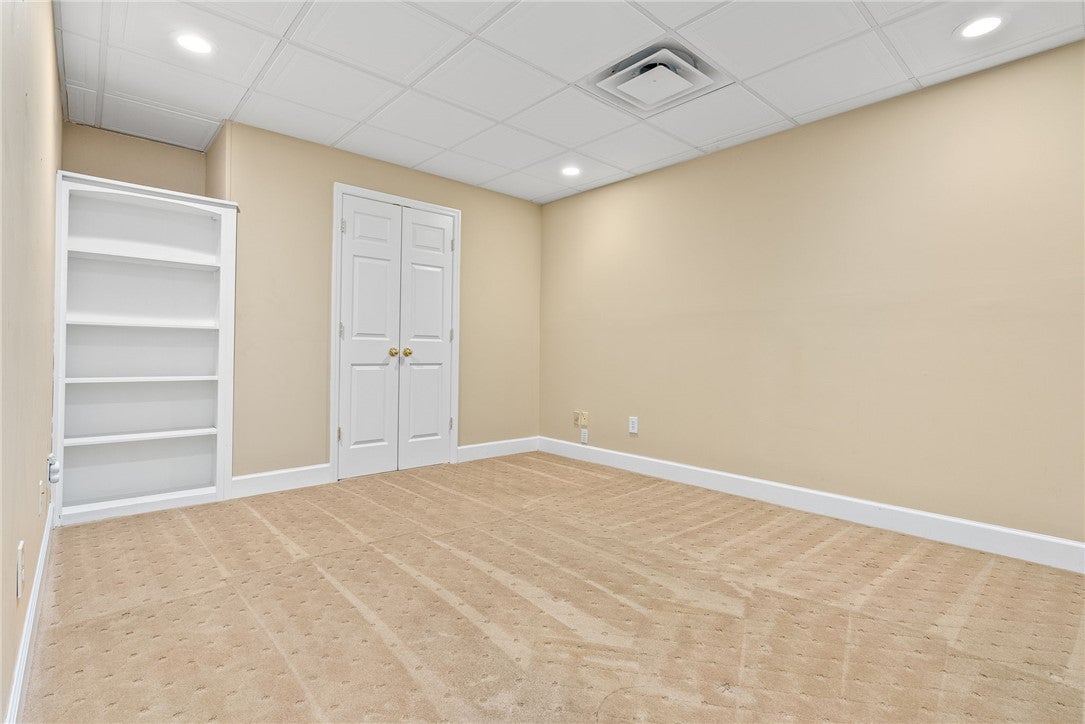 369 Oak Ridge Drive Auburn, AL 36832 - Photo 38 of 48 Basement Bonus Room 1 with closet & Built ins