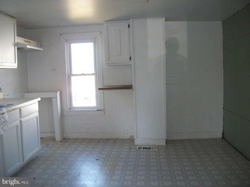 12317 Warner Road Keymar, MD 21757 - Photo 3 of 5 a view of an empty room with a window