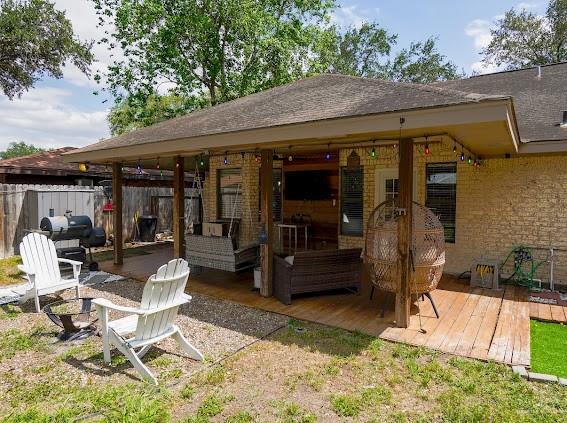 3200 Hummingbird Avenue McAllen, TX 78504 - Photo 26 of 31 a view of a patio with table and chairs near an umbrella